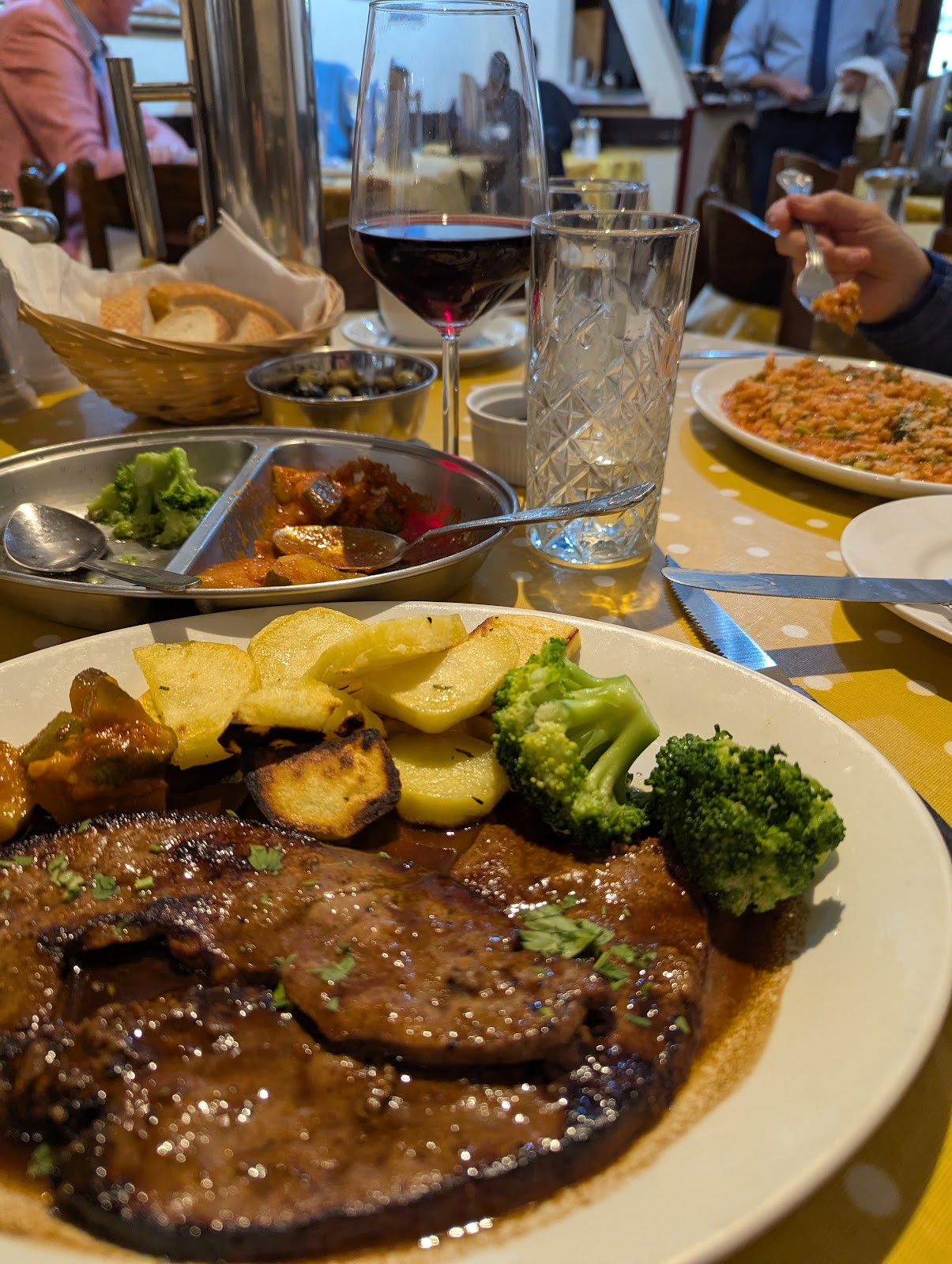Grilled steak with roast potatoes and broccoli at Anacapri