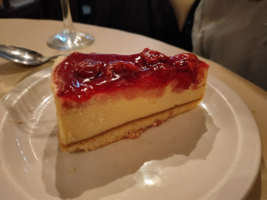 Cheesecake with berry sauce at Anacapri